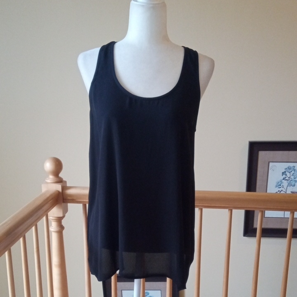 Lush Brand Black Sleeveless Top With Cascading Ruffled Back Panel